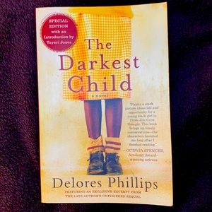 ‘The Darkest Child’ by Delores Phillips (paperback; used; great condition)
